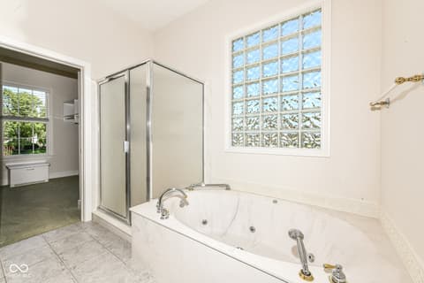 Primary bathroom at 10655 Sunset Point Lane, Fishers, IN