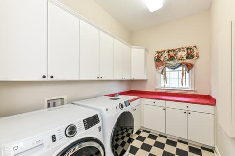 Laundry room at 10655 Sunset Point Lane, Fishers, IN