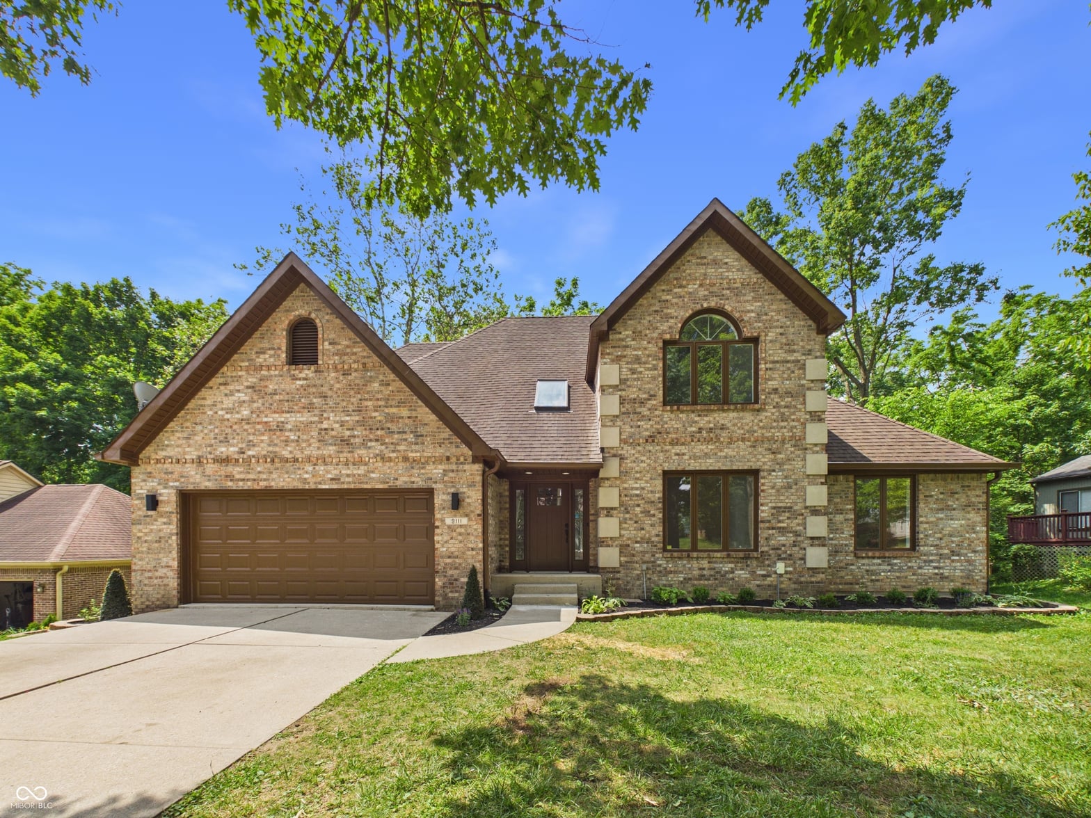 Front exterior at 9111 Pinecreek Court, Indianapolis, IN