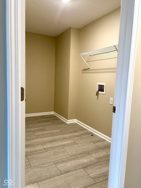 Laundry room at 9789 Mystic Sun Court, Fishers, IN