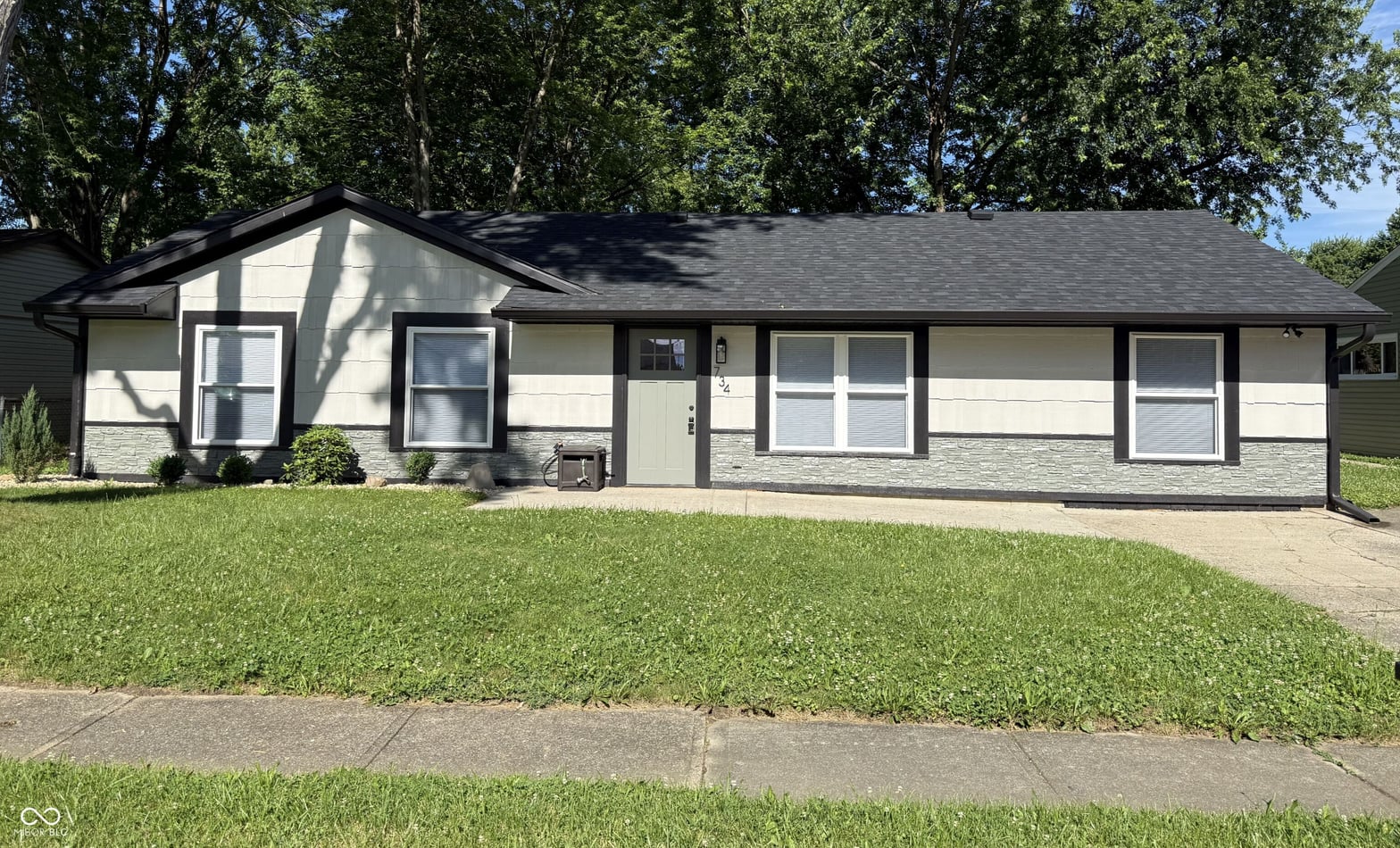 Front exterior at 734 Holiday Drive, Fortville, IN