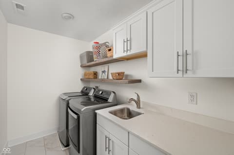 Laundry room at 6790 Pulaski Court, Carmel, IN