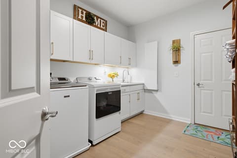 Laundry room at 15426 Mission Hills Drive, Carmel, IN